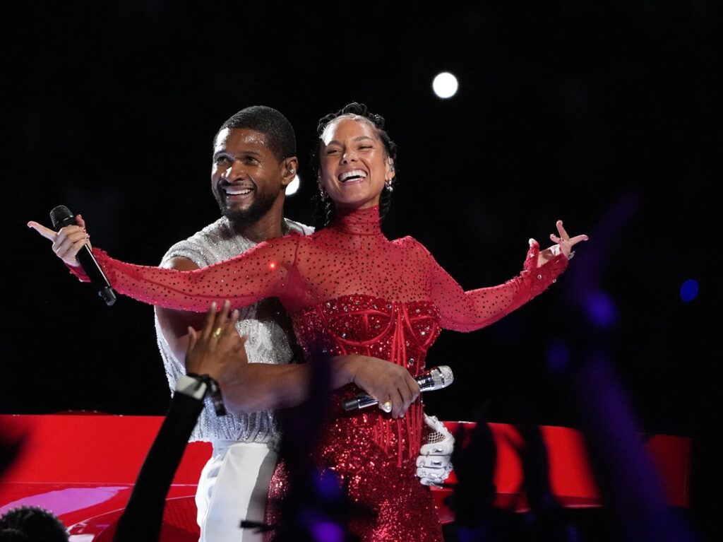 US singer-songwriter Usher performs with US singer-songwriter Alicia Keys (R) during Apple Music halftime show of Super Bowl LVIII between the Kansas City Chiefs and the San Francisco 49ers at Allegiant Stadium in Las Vegas, Nevada, February 11, 2024. (Photo by TIMOTHY A. CLARY / AFP) (Photo by TIMOTHY A. CLARY/AFP via Getty Images)